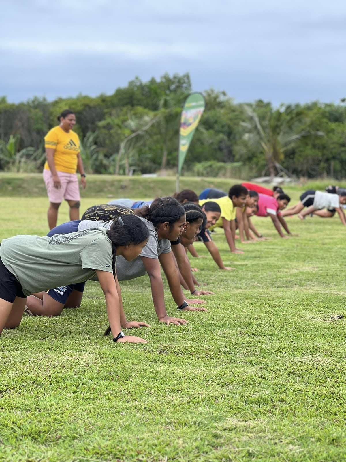 Members of FWRM's GIRLS program in the start position for a race.