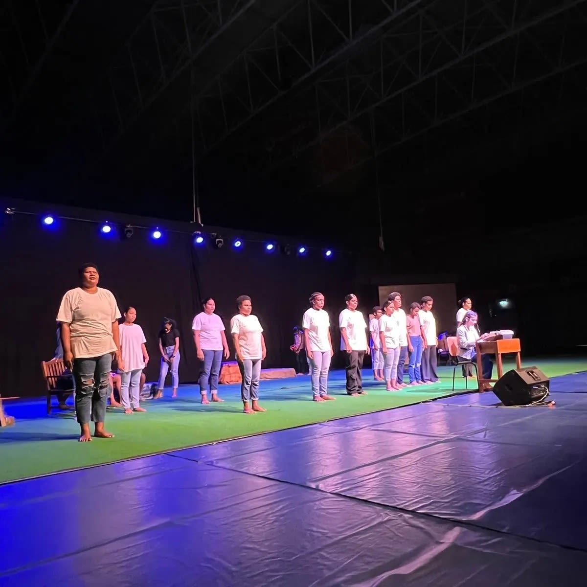 Members of FWRM's GIRLS program on stage as part of their theatre production for 16 Days of Activism.