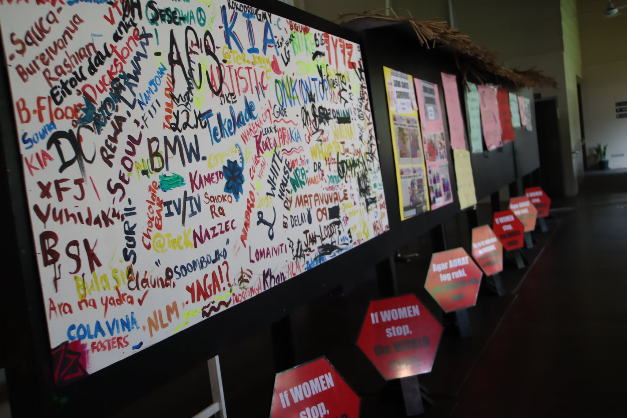Signs displayed at Fiji Women's Rights Movement's 'If Women Stop, The World Stops' event.